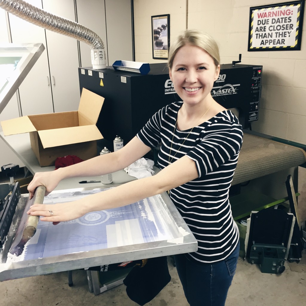 Hannah Thiessen of Brand Dispatch learning the screen printing process. Hannah and her husband will travel to the Philippines this spring to get the new brand launched. 