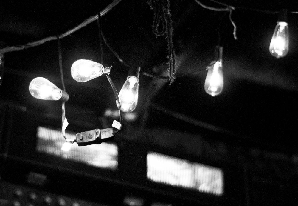 black and white photo of Christmas lights