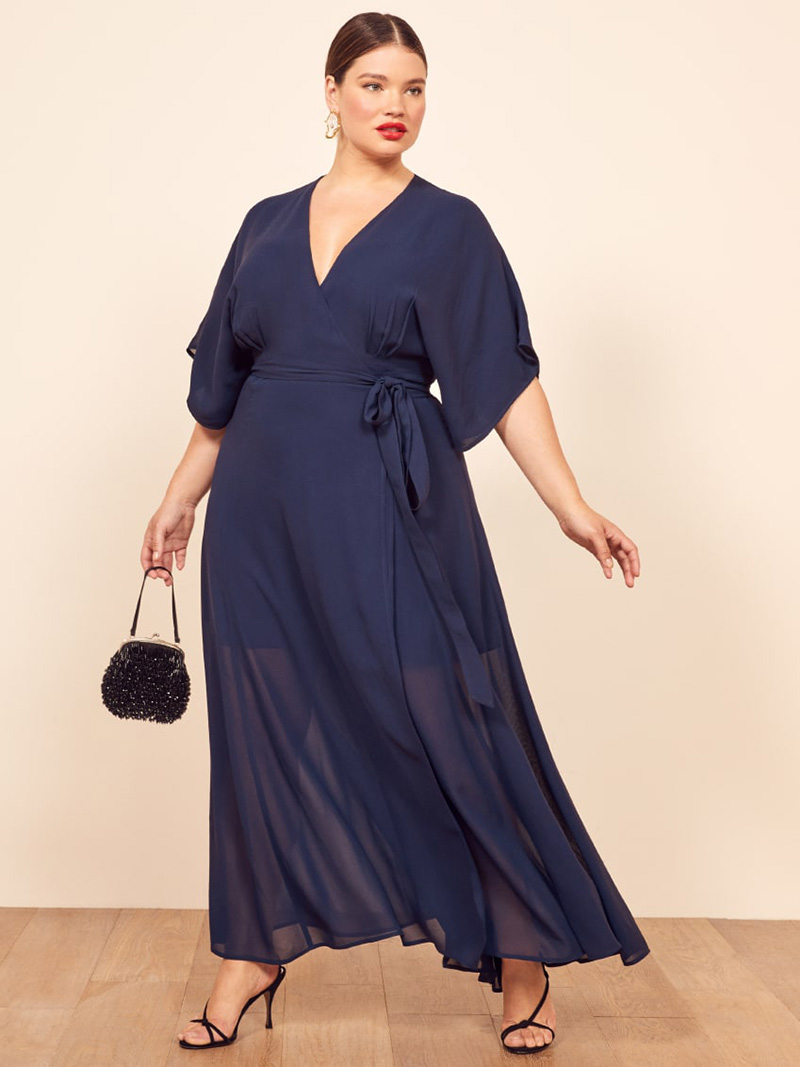A woman wearing a maxi dress from Reformation. 